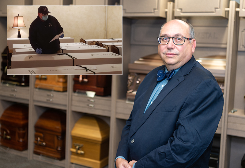 David Penepent stands in front of caskets in the Funeral Services Lab. Inset - Penepent examines boxes of remains in NYC.