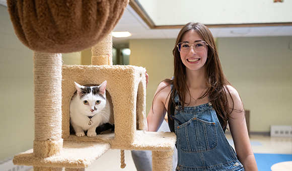 Victoria Bonavita and her cat, Luca in the Pet Wing.