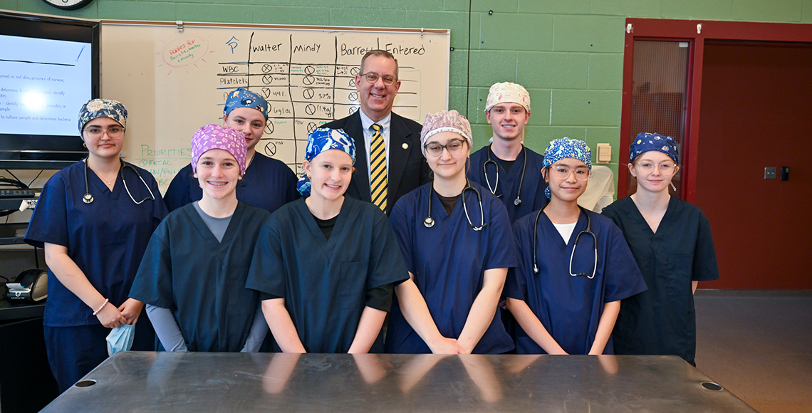 Assemblyman Scott Gray poses with MASH Camp attendees.