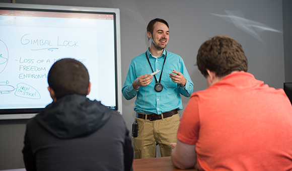 Ryan Hewer teaches in one of SUNY Canton's Flex Classrooms