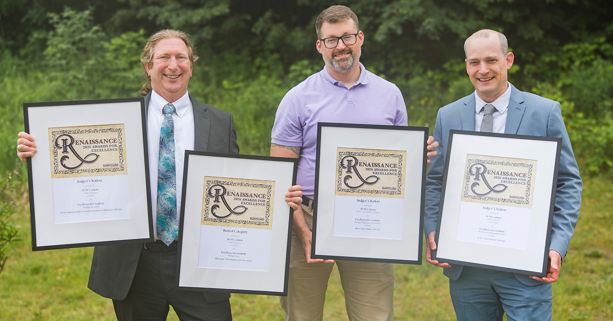 Greg Kie, Matt Mulkin and Travis Smith hold up 2026 SUNYCUAD awards.