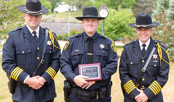 St. Lawrence County Undersheriff Sean O’Brien, new Deputy Patrick Chapman, and Sheriff Brooks Bigwarfe