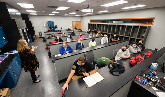 Associate Professor Kelly Peterson teaches a class in the new Criminal Investigation laboratory.