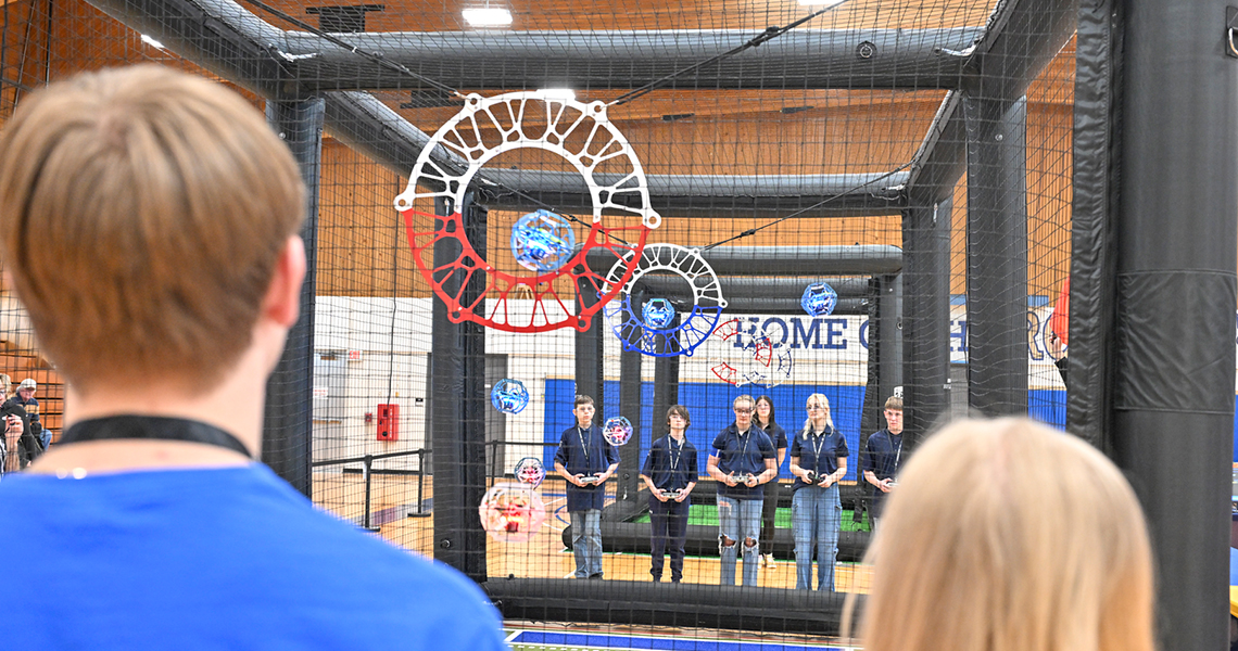 Competitors battle during a drone soccer match qualifier from SUNY Canton's Dana Hall.