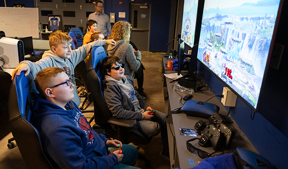 Students play video games in the Esports Arena during Engineer's Week.
