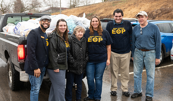 EOP stand in front of a truck filled with supplies for Ukraine.