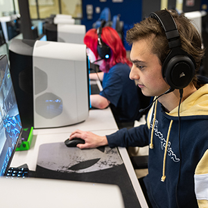 A student games in the Esports Arena.