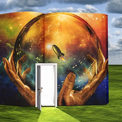 A fictional doorway inside a colorful book outside on a green lawn.