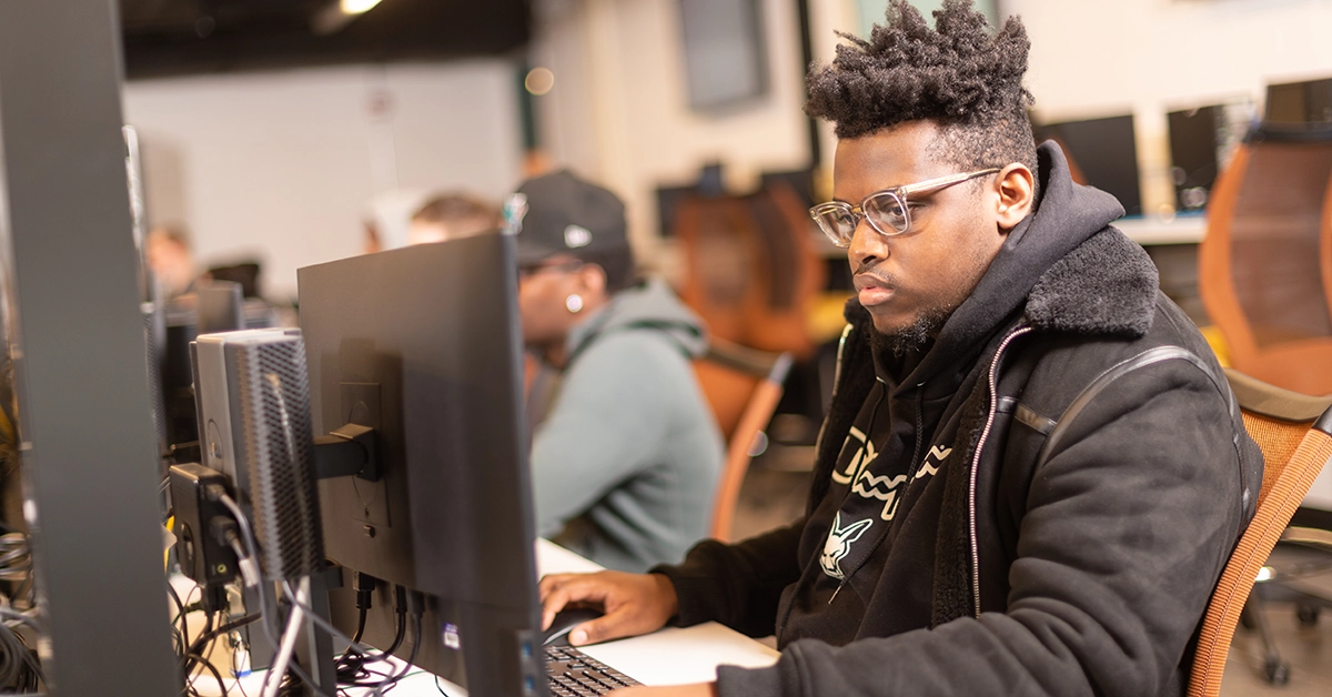 A student works in the networking lab.