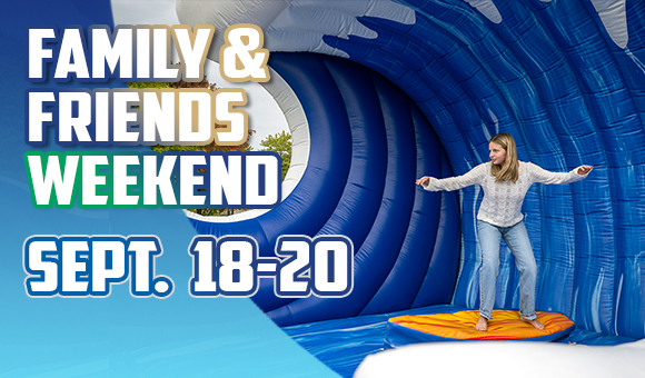 Family & Friends Weekend Sept 18-20: Student on inflatable surf board