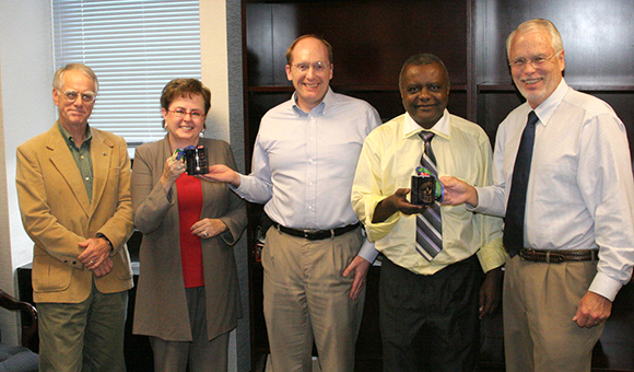 Charles Fenner and Edouard Mafoua honored in 2009 by President Kennedy, Provost Trumble and Dean Heilman.