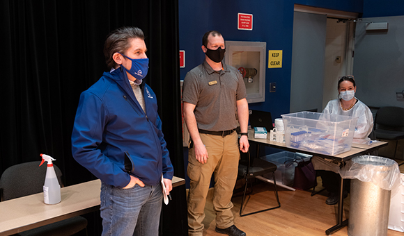 Chancellor Malatras meets with testing staff during his visit to the COVID-19 Testing Center in Kingston Theater