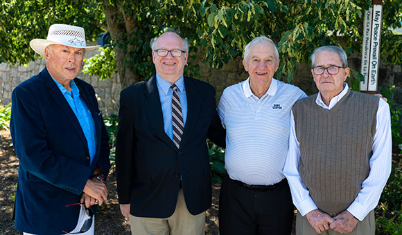 A group of donors stand with SUNY Canton President Zvi Szafran