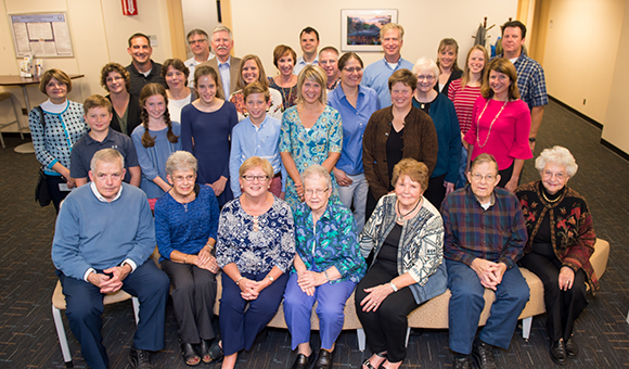 A large group of family and friends gathered for the Kenneth Theobald Botanical Nursery dedication ceremony.