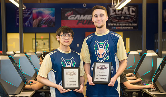 My Dang and Alexander DeLavergne hold their All Tournament awards.