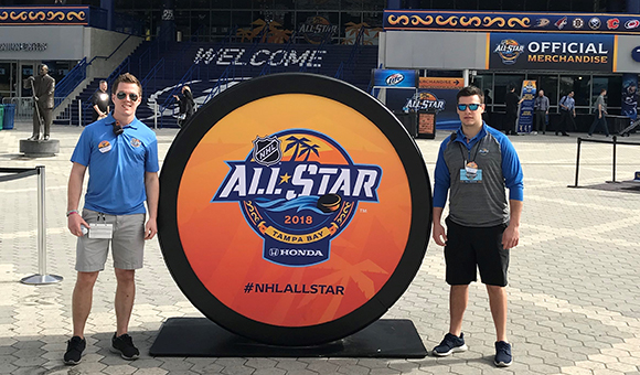 Patrick Murray ´17 and Kyle Dora ´17 stand outside the Amalie Arena in Tampa, Florida during the 2018 NHL All-Star game.