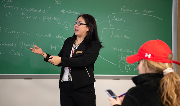 Associate Professor Ran Li teaches an accounting class.