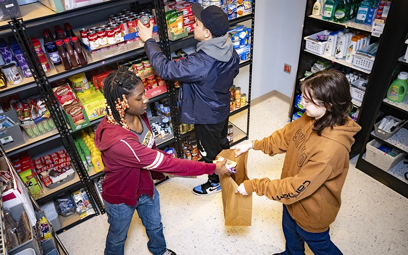 Students select items from the Renzi Food Pantry in Miller Campus Center.