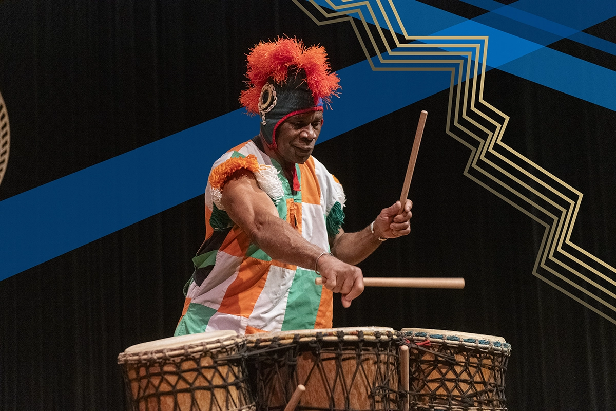 An African drummer performs in Kingston Theater.