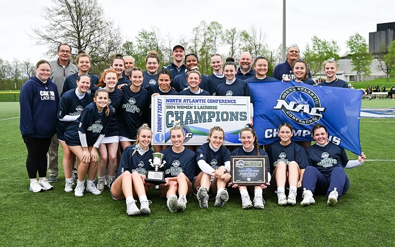 Women's Lacrosse celebrates their fourth NAC Championship.