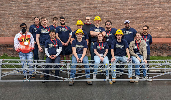 Members of the SUNY Canton American Society of Civil Engineers (ASCE) Student Chapter with their award-winning steel bridge.