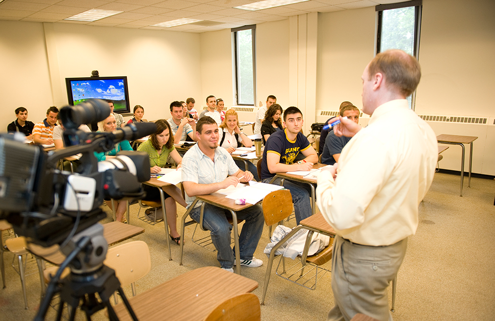 Professor Fenner teaches a class of Bosnian students